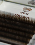 Close-up of brown lash extensions showing rich natural pigment and high-quality elastic fiber