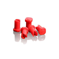 Red plastic components on a white background