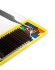 Close-up of Rili Choco brown lash extensions showing rich chocolate color and premium Korean fiber quality
